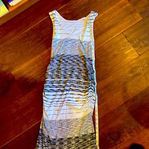 Cute Athleta tank dress with ruching and stripes. Flattering and fitted.